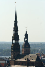 A Clock-Topped Building In Riga Seen From Above.