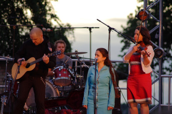 A Group Of People Playing Music In Dzelzs Vilks Ielīgo '09.