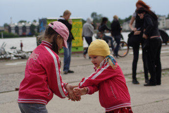A Girl Wearing A Pink Jacket At The Ielīgo '09 Festival.