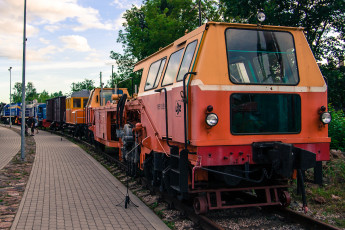 A Train Museum Showcases A Parked Train On A Track.