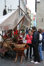 A Wooden Cart With A Tarp In Tallinn.